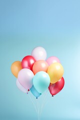 bright balloons isolated on blue background