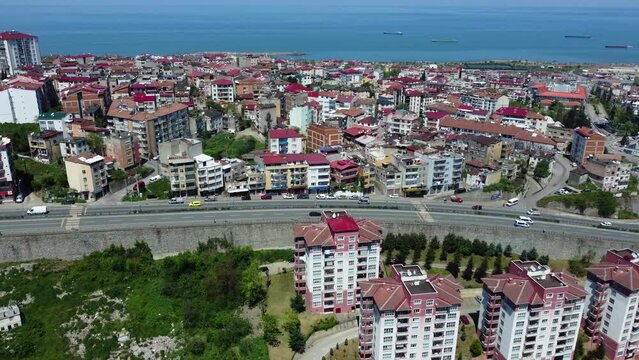 Aerial view of the Turkish port city of Trabzon, showcasing the seashore and cityscape from above.