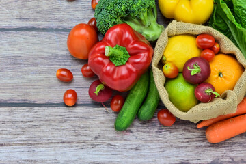 Healthy food background, healthy vegetarian food in paper bags, fruits and vegetables, banner copy...