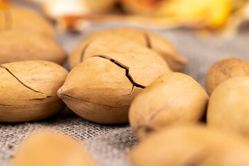 Unpeeled crunchy pecans close up