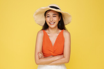 Portrait young beautiful Asian woman in summer casual clothes. carefree woman posing on yellow background in studio. Positive model having fun. Cheerful and happy