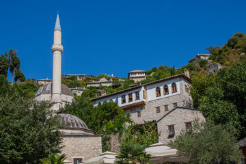Fototapeta na wymiar Počitelj or Poçitel, historic urban site or village in Bosnia and Herzegovina, mediaeval and Ottoman architecture, minaret and clock tower, city walls or fortress