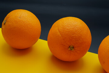 sunkist orange on a dark and yellow background