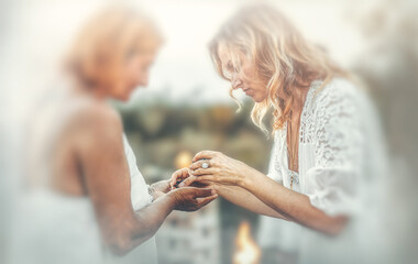 essential oil in a woman hand, ceremony space.