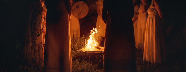 Women at the night ceremony. Ceremony space.