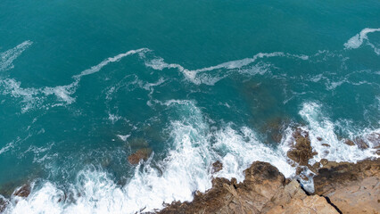 waves on the rocks in tuscany sea