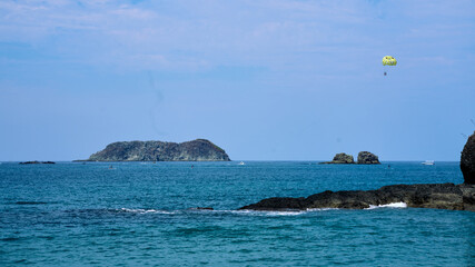 Marine Serenity: Tourists Enjoying Island Adventures in Crystal Blue Seas