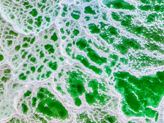 Texture of the green salt lake.