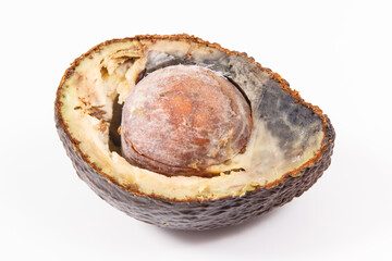 Inedible avocado with mold. White background. Unhealthy food
