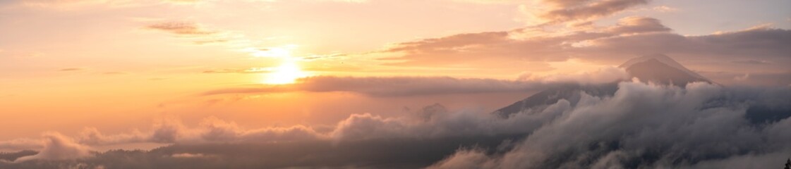 Sunrise over mount Agung and lake Batur, panoramic picture