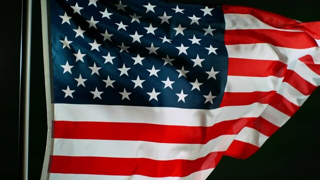 Close up of Waving American Flag on Black Background, Super Slow Motion, Filmed on High Speed Cinematic Camera at 1000 FPS
