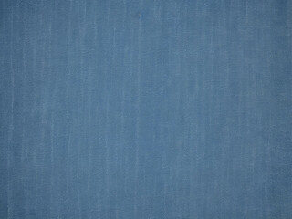 Denim texture close-up, background for the design with a place for the text.