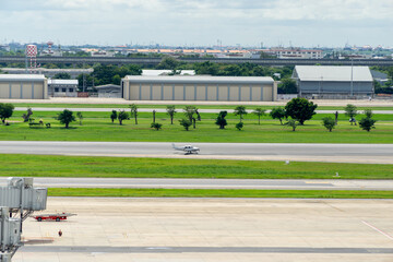 Passanger plane lands. Airplane on the platform of Airport. Runway.