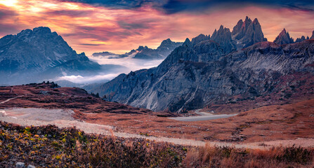 Unbelievable autumn scene of Tre Cime Di Lavaredo National Park. Majestic morning view of Dolomite...