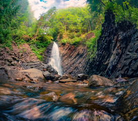 Rocky summer view of Zhenetsʹkyy Huk waterfall. Fantastic morning scene of Carpathian mountains, Ukraine, Europe. Beauty of nature concept background. - obrazy, fototapety, plakaty