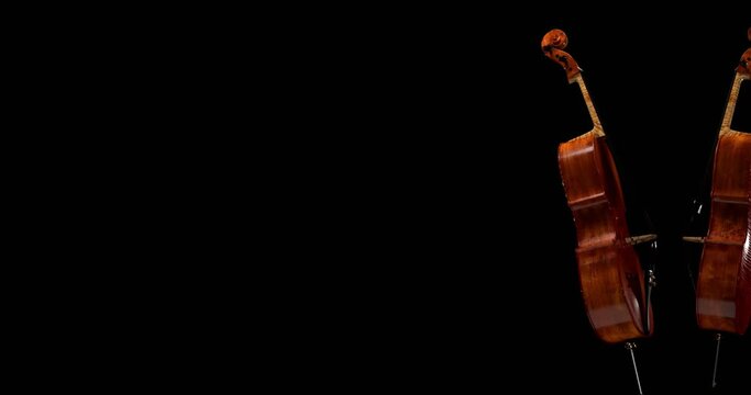 cellos on a black background, dancing to the rhythm of a waltz, fantasy, background for classical music, 3d render