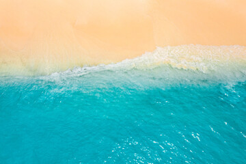 Top drone view fantastic popular travel landscape. Summer seascape blue water yellow sand. Aerial amazing tropical nature background. Beautiful  mediterranean bright sea waves crash beach sunlight