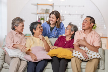 Portrait happy elderly people, doctor talking together, consulting mental health, smiling with happiness, sitting in indoor nursing home, community. Retirement, Healthcare Concept.