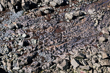 Rocks and pebbles on the coast of the Atlantic Ocean