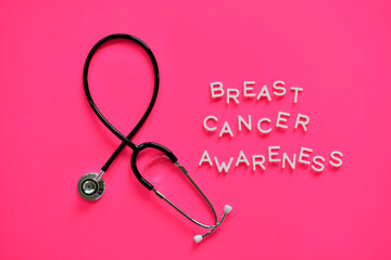 October is Breast Cancer Awareness Month stethoscope shaped into a remembrance awareness ribbon pink