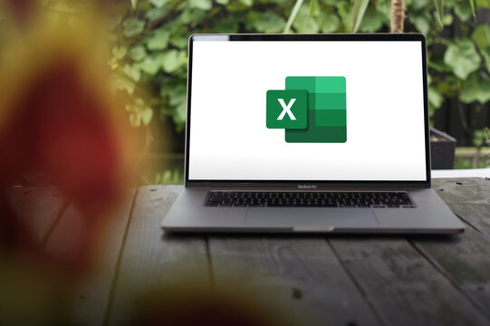 Microsoft Excel logo, a spreadsheet editor developed by Microsoft, displayed on a MacBook Pro screen