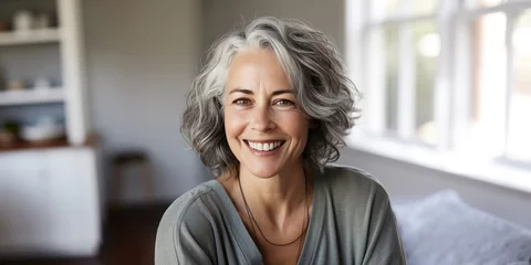 Fotobehang Middle age woman with white hairs smiling, laughing  © Koray