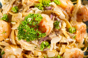 Delicious fettuccine pasta with shrimp and parsley