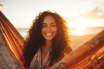 Kussenhoes Mixed race woman on beach holiday lying in hammock reading book during sunset © wolfhound911