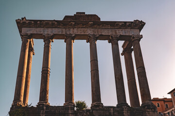 Ruins of Temple of Saturn located against cloudless sky in roman forum in Rome, Italy