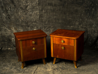 vintage wooden cabinets on a dark gray background