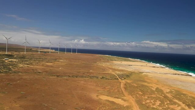 Vader Piet Wind Farm in Aruba &ndash; Aerial Drone View of Renewable Energy Turbines by the Coast