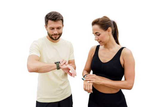 People friends a woman and a man use a fitness watch and an app for running in sportswear. Healthy and active lifestyle. Isolated background.