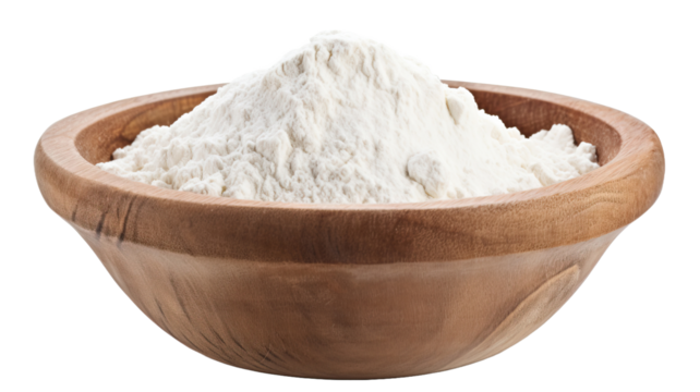 Flour in a wooden bowl isolated on a white background