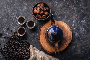 Traditional Arabian Coffee Set and Dates on Grey Background 