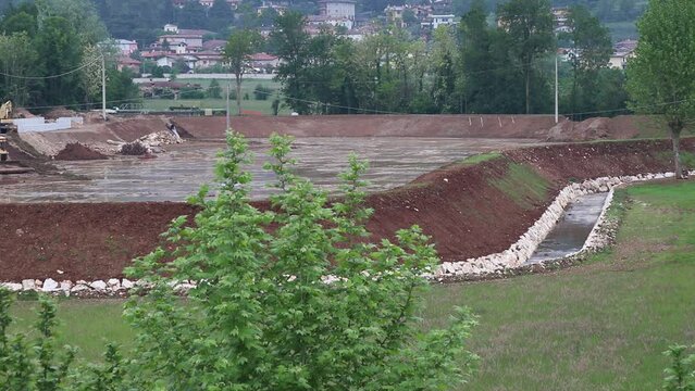 reservoir to accommodate water in case of floods