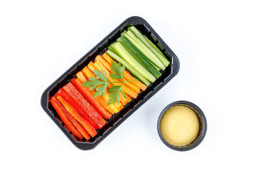 bell pepper, carrots, cucumber, cheese sauce
 on a white background, studio shot