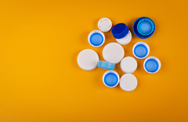 Plastic Bottle Caps Pile. Recycling HDPE Material Group, Circle Polyethylene Lid Set, Colorful Caps Group