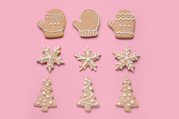 Set of different Christmas cookies on pink background