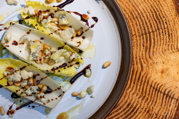 Belgium endive boats with nuts and cheese
