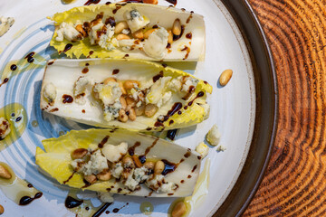 Belgium endive boats with nuts and cheese
