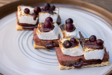 huckleberry s'mores served outdoors
