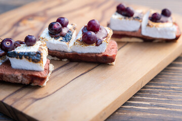 huckleberry s'mores served outdoors