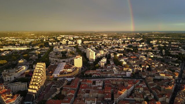 Montpellier from above: urban beauty meets the majesty of a multi-colored rainbo