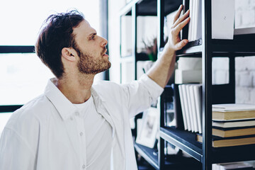 hipster guy sending text messages on smartphone using app and 4G connection