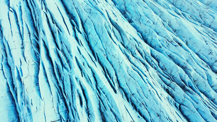 Aerial view of blue glacier blocks on vatnajokull ice cap in iceland, massive icebergs and...