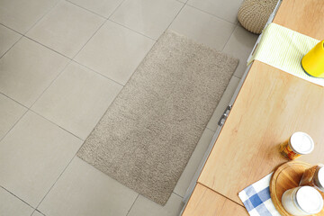 Interior of light kitchen with soft carpet, top view