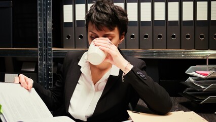 Law agent reviews classified records, conducting investigation into the organized crime case....