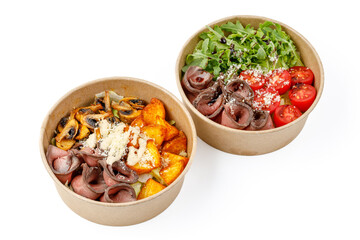 Salad with roast beef and truffle oil and Salad with roast beef and potatoes on a white background, studio shot 1