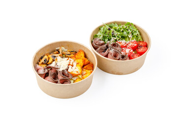 Salad with roast beef and truffle oil and Salad with roast beef and potatoes on a white background, studio shot