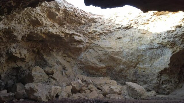 Cave with hole overlooking the sky. Sicily.